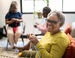 A woman in a knitting group.
